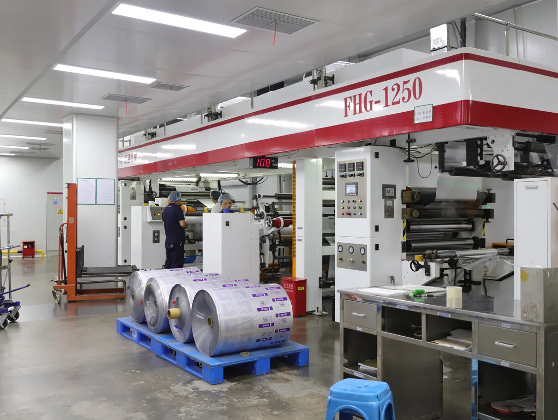 Lamination equipment with film rolls at a partner manufacturing facility